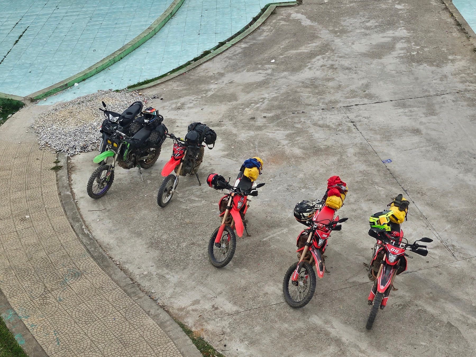 A private group of motorcycle riders stopping together in Ha Giang